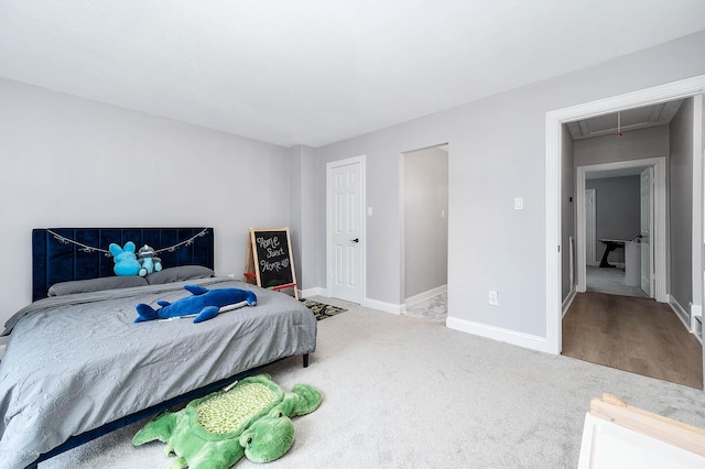 17706 August Meadows Ln, Spring, TX 77379 - bedroom with attic access, carpet flooring, and baseboards