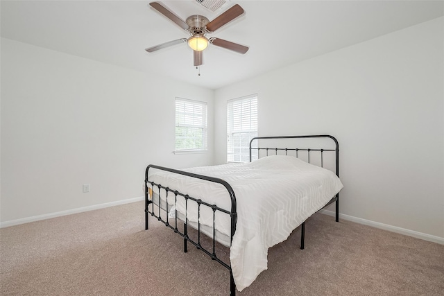 24511 Peroni Dr, Richmond, TX 77406 - bedroom with carpet floors, baseboards, and a ceiling fan