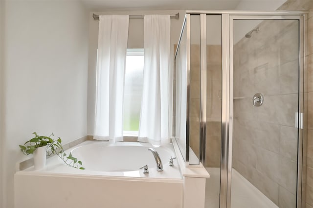 4502 Kayden Berry Ct, Rosenberg, TX 77471 - bathroom featuring a stall shower and a bath