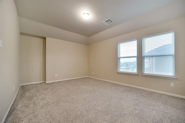 4502 Kayden Berry Ct, Rosenberg, TX 77471 - carpeted spare room with baseboards and vaulted ceiling