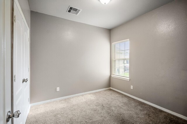 25807 Boxwood Hedge Ln, Tomball, TX 77375 - unfurnished room featuring carpet and baseboards
