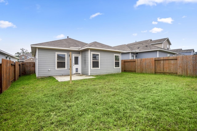 25807 Boxwood Hedge Ln, Tomball, TX 77375 - rear view of house featuring a patio area and roof with shingles