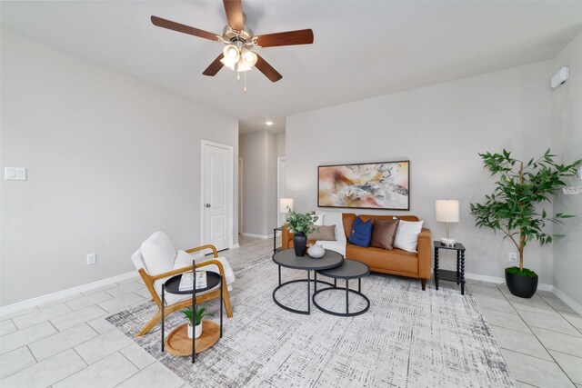 25807 Boxwood Hedge Ln, Tomball, TX 77375 - sitting room featuring light tile patterned flooring, ceiling fan, and baseboards