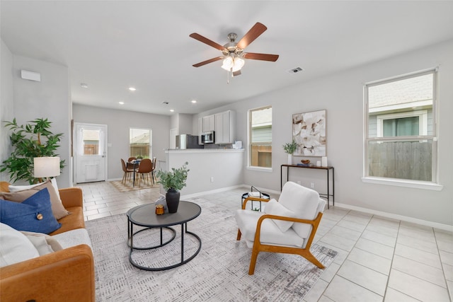 25807 Boxwood Hedge Ln, Tomball, TX 77375 - living area with light tile patterned floors, a ceiling fan, baseboards, and recessed lighting
