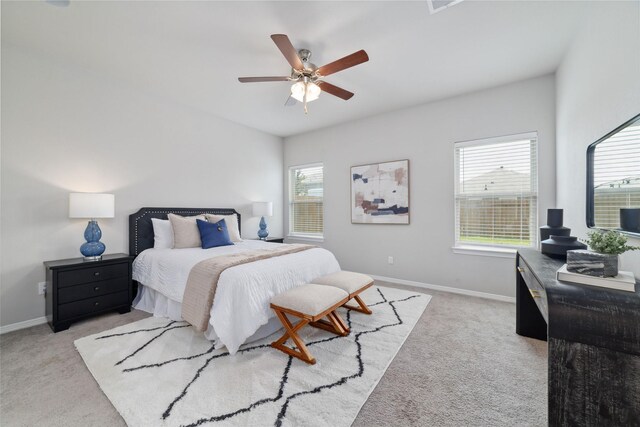 25807 Boxwood Hedge Ln, Tomball, TX 77375 - carpeted bedroom with baseboards, ceiling fan, and an office area