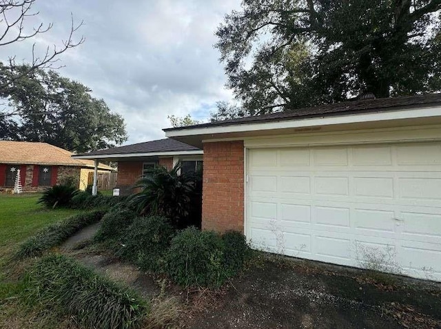 718 Westbury St, West Orange, TX 77630 - view of side of property featuring brick siding