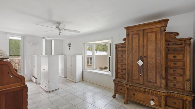 368 Riddle Rd, Cedar Creek, TX 78612 - bathroom with a ceiling fan, tile patterned flooring, and baseboard heating