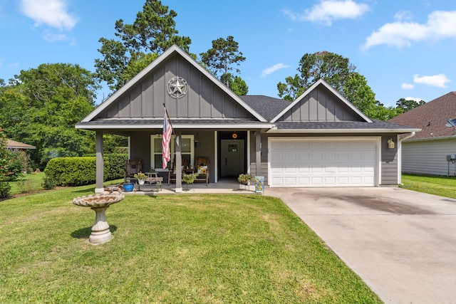 129 Bridgepoint, Onalaska, TX 77360 - view of front of house with board and batten siding, an attached garage, concrete driveway, a front lawn, and a shingled roof