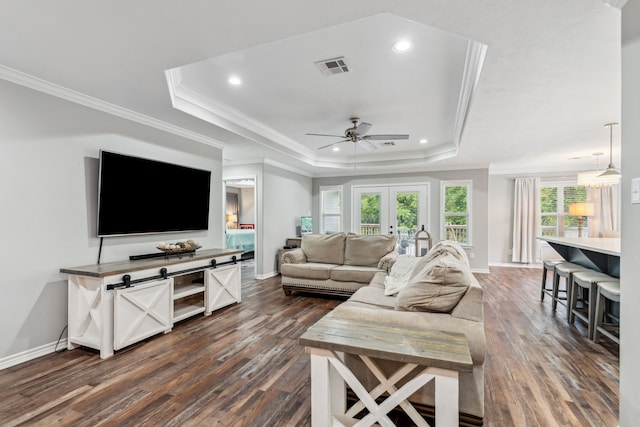 129 Bridgepoint, Onalaska, TX 77360 - living room featuring a tray ceiling, dark wood finished floors, baseboards, recessed lighting, and a ceiling fan