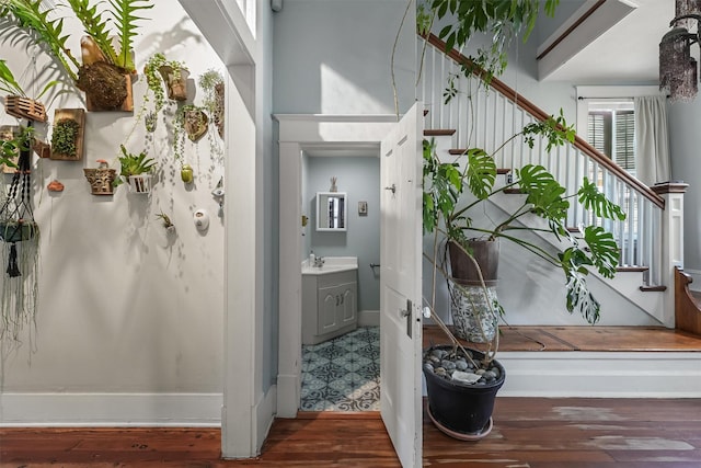 811 18th St, Galveston, TX 77550 - corridor with stairway and wood finished floors