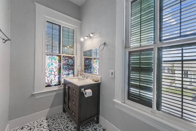 811 18th St, Galveston, TX 77550 - bathroom featuring vanity and tile patterned flooring