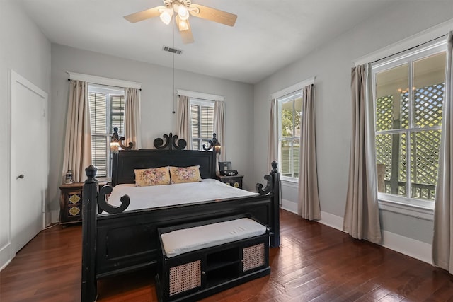 811 18th St, Galveston, TX 77550 - bedroom featuring multiple windows, dark wood finished floors, and ceiling fan