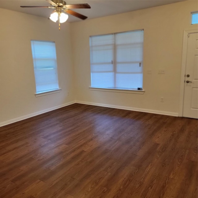 322 7th Ave N, Texas City, TX 77590 - entrance foyer featuring dark wood-style floors, ceiling fan, and baseboards