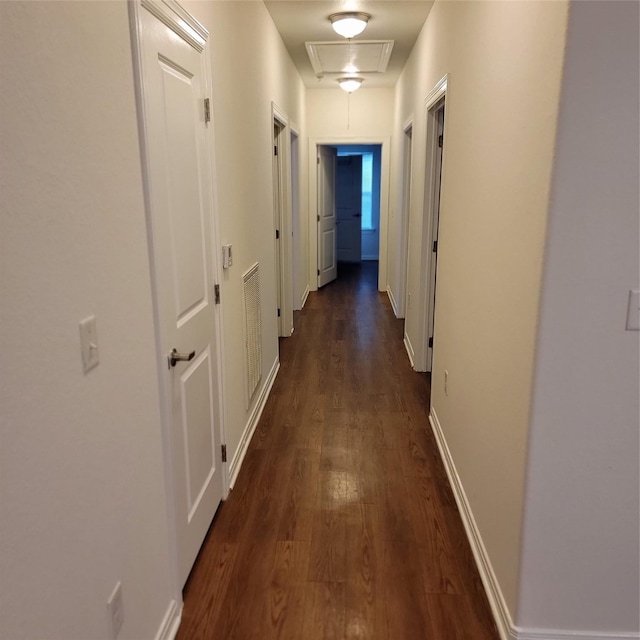 322 7th Ave N, Texas City, TX 77590 - hallway with dark wood-style floors, attic access, and baseboards