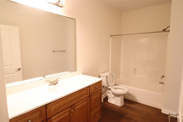 322 7th Ave N, Texas City, TX 77590 - bathroom featuring vanity, toilet, wood finished floors, and bathing tub / shower combination