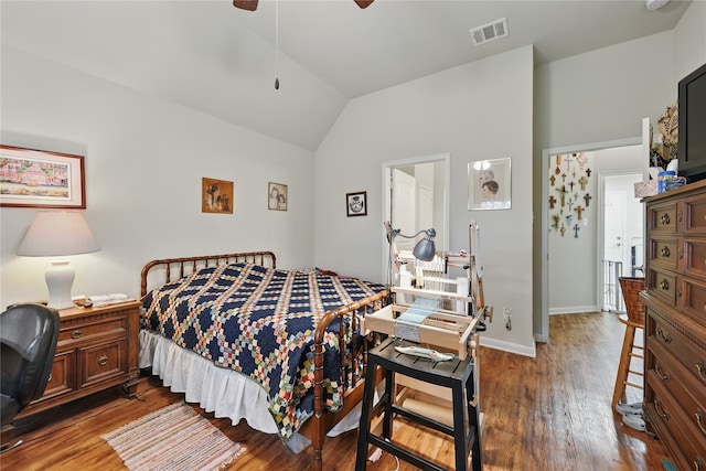 2209 Parker Ct, Brenham, TX 77833 - bedroom with vaulted ceiling, wood finished floors, baseboards, and a ceiling fan
