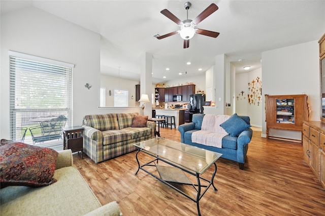 2209 Parker Ct, Brenham, TX 77833 - living room with a ceiling fan, light wood finished floors, and recessed lighting