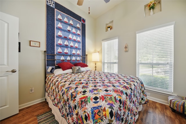 2209 Parker Ct, Brenham, TX 77833 - bedroom with wood finished floors, baseboards, and ceiling fan