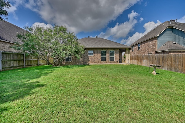 2209 Parker Ct, Brenham, TX 77833 - rear view of house featuring brick siding