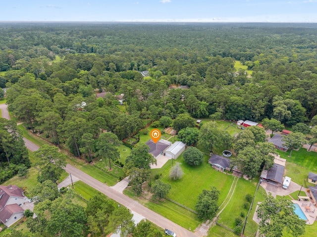 136 Fantail St, Magnolia, TX 77355 - aerial view of a heavily wooded area