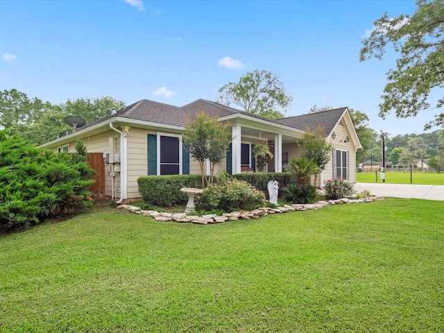 136 Fantail St, Magnolia, TX 77355 - view of front of home featuring a front yard, concrete driveway, and roof with shingles