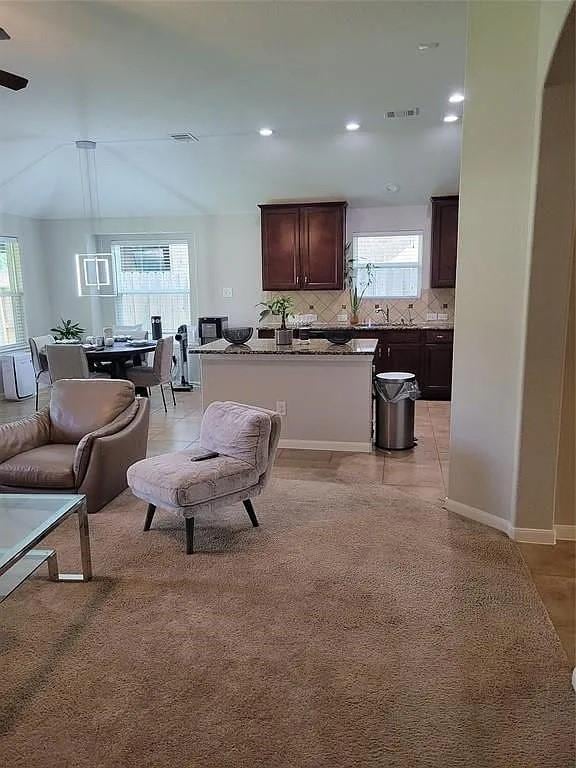 17023 Tallgrass Prairie Ln, Humble, TX 77346 - living area with recessed lighting, ceiling fan, and light colored carpet