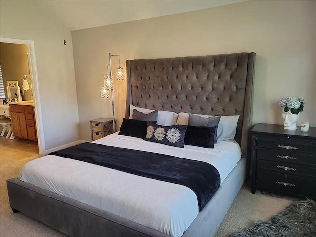 17023 Tallgrass Prairie Ln, Humble, TX 77346 - bedroom with light colored carpet and ensuite bath