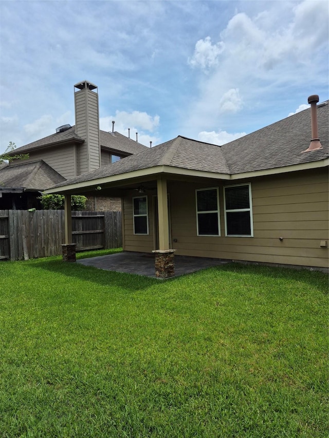 17023 Tallgrass Prairie Ln, Humble, TX 77346 - rear view of house with a patio and a shingled roof