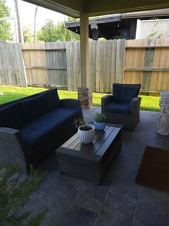 17023 Tallgrass Prairie Ln, Humble, TX 77346 - view of patio featuring outdoor lounge area