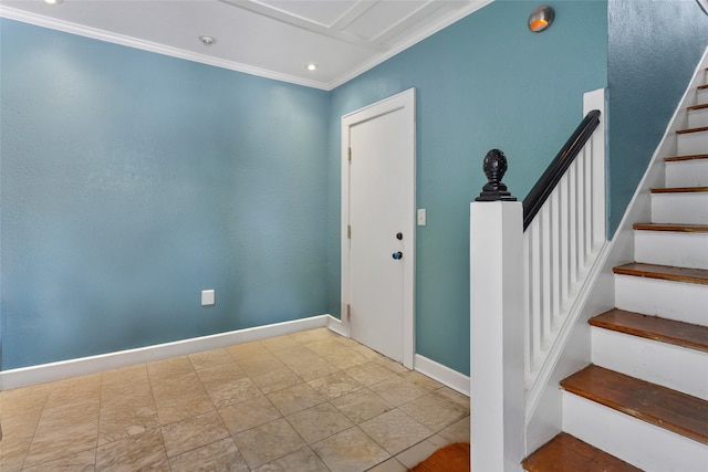 2616 45th St, Galveston, TX 77550 - foyer entrance with stairway, crown molding, and baseboards