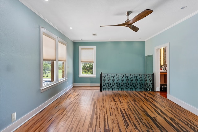 2616 45th St, Galveston, TX 77550 - unfurnished room with ornamental molding, ceiling fan, baseboards, wood finished floors, and recessed lighting
