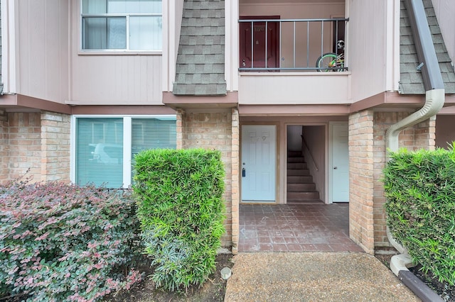 12633 Memorial Dr Unit 179, Houston, TX 77024 - property entrance with brick siding
