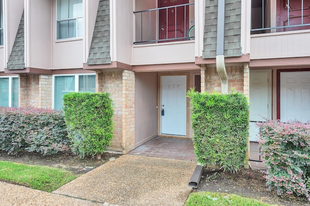 12633 Memorial Dr Unit 179, Houston, TX 77024 - entrance to property with brick siding