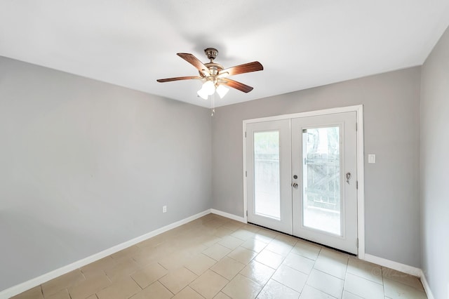 12633 Memorial Dr Unit 179, Houston, TX 77024 - spare room featuring french doors, baseboards, ceiling fan, and light tile patterned flooring