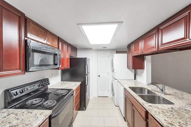 12633 Memorial Dr Unit 179, Houston, TX 77024 - kitchen featuring stainless steel microwave, electric range, dark brown cabinets, and estacked washer and dryer