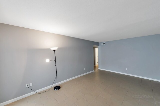 12633 Memorial Dr Unit 179, Houston, TX 77024 - spare room with baseboards