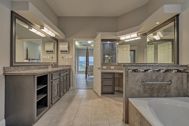 2815 Pine Arbor Dr, Montgomery, TX 77356 - full bathroom featuring a garden tub, vanity, a shower stall, and baseboards