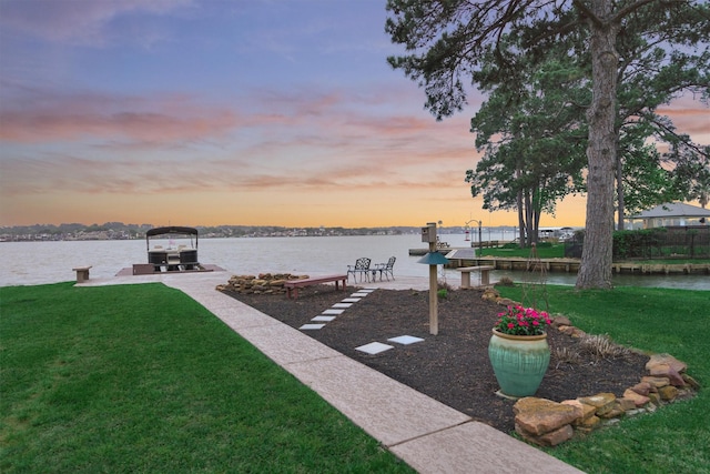 2815 Pine Arbor Dr, Montgomery, TX 77356 - view of home's community featuring a boat dock, a yard, and a water view