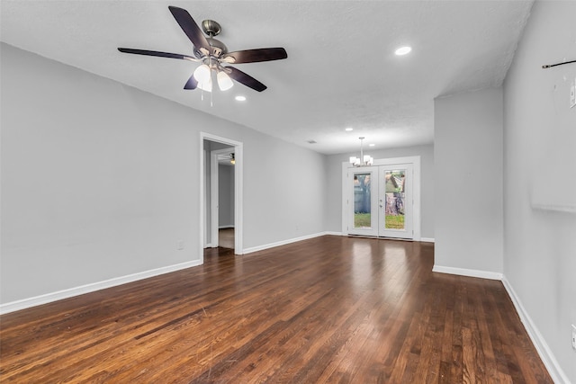 2032 Vince St, Pasadena, TX 77502 - unfurnished living room featuring dark wood-type flooring, a chandelier, a ceiling fan, baseboards, and recessed lighting