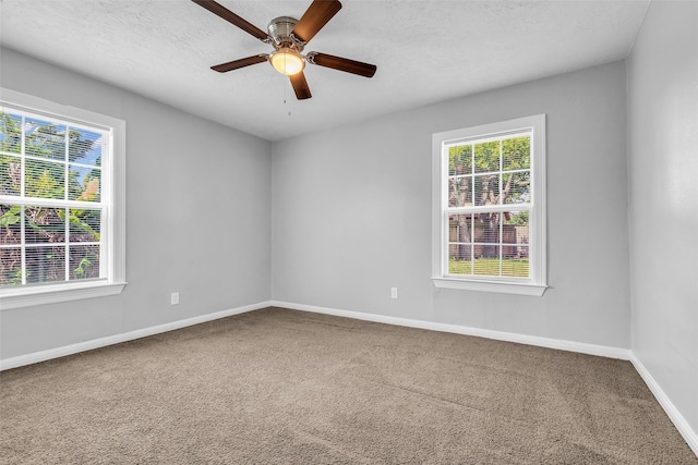 2032 Vince St, Pasadena, TX 77502 - carpeted empty room with baseboards, a ceiling fan, and a textured ceiling