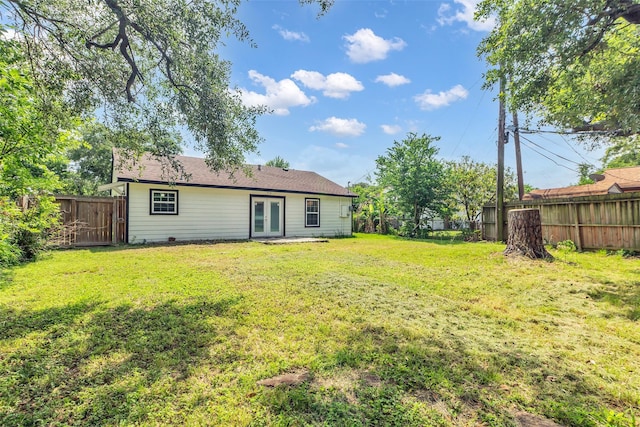 2032 Vince St, Pasadena, TX 77502 - rear view of house with french doors