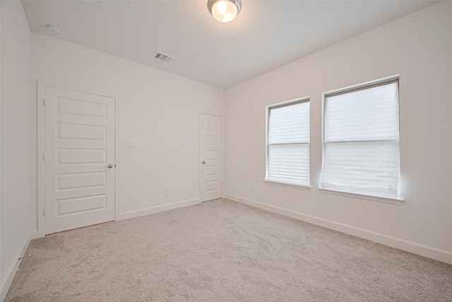 30351 Spragletop View St, Brookshire, TX 77423 - spare room with light colored carpet, baseboards, and a smoke detector