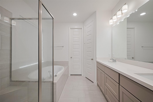 30351 Spragletop View St, Brookshire, TX 77423 - full bathroom featuring a stall shower, double vanity, a garden tub, recessed lighting, and tile patterned floors