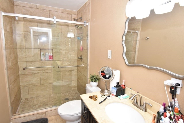 6413 Ella Lee Ln, Houston, TX 77057 - bathroom with a shower stall, toilet, and vanity