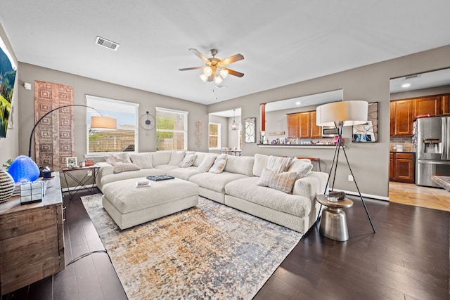 13526 Astley Acres Ln, Cypress, TX 77429 - living room featuring a ceiling fan and light wood-style flooring