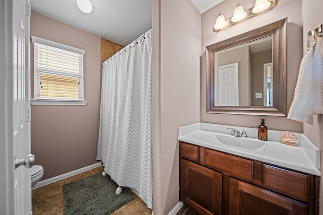 13526 Astley Acres Ln, Cypress, TX 77429 - bathroom featuring vanity, toilet, a shower with curtain, tile patterned floors, and baseboards