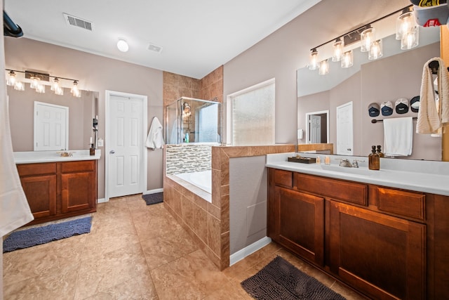 13526 Astley Acres Ln, Cypress, TX 77429 - bathroom with a stall shower, two vanities, a bath, and tile patterned flooring