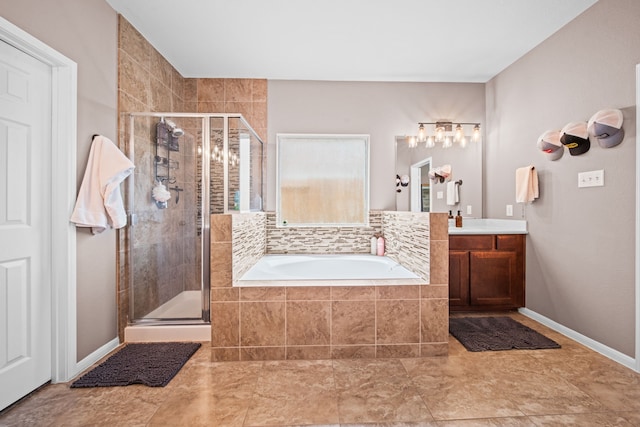 13526 Astley Acres Ln, Cypress, TX 77429 - full bathroom featuring vanity, a bath, a stall shower, and baseboards