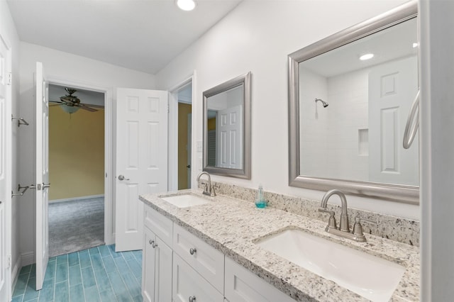 20234 Brondesbury Dr, Katy, TX 77450 - full bath featuring double vanity, recessed lighting, a ceiling fan, and wood finished floors