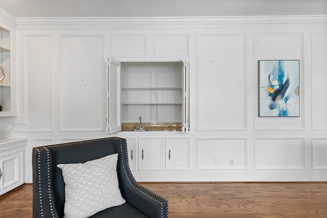20234 Brondesbury Dr, Katy, TX 77450 - sitting room featuring bar with sink and a decorative wall